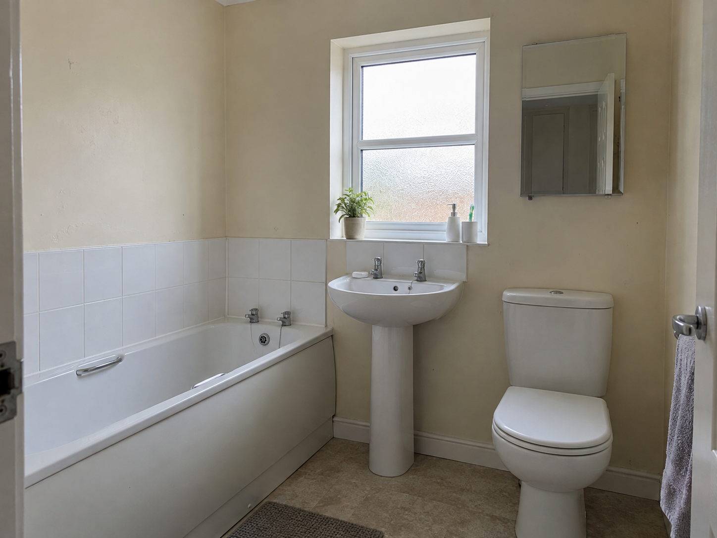 Dull bathroom before repainting